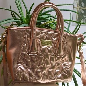 Metallic pink Betsey Johnson crossbody purse